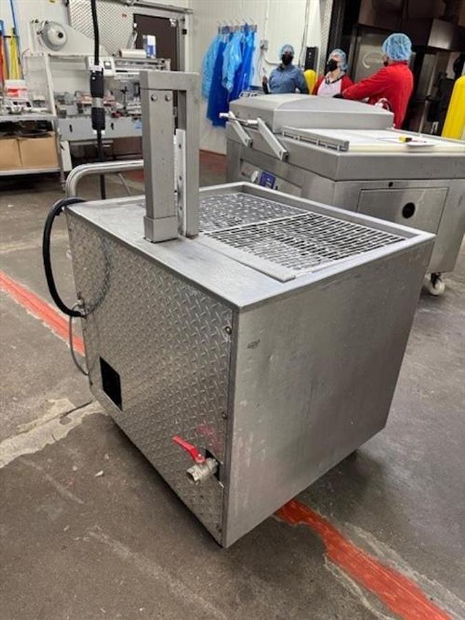 Used Ultra Source Ultravac 880 vacuum packager & Henkelman DT 100 diptank