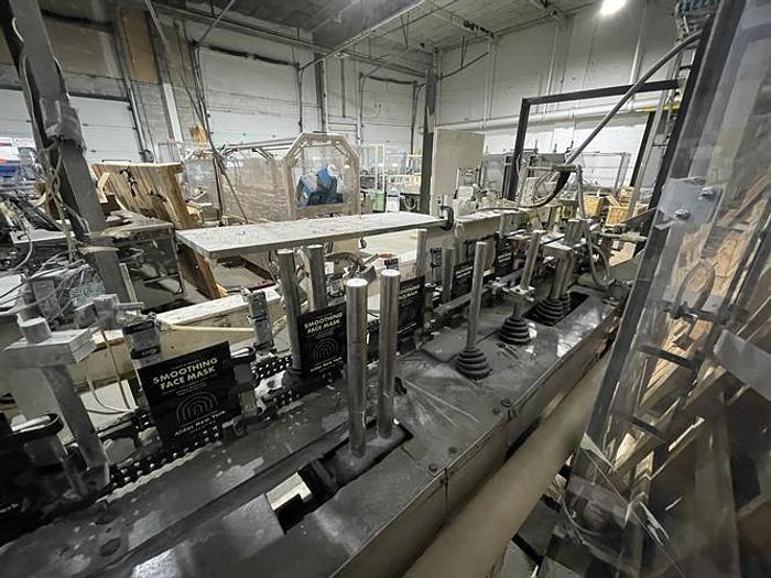 Used Bartelt model IM7 Pouch Packager with AMS Auger Filler and  liquid filler