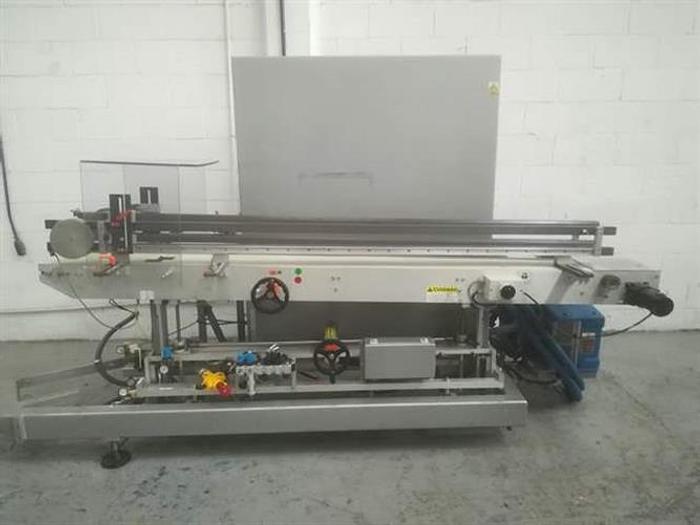 Used Serpa model 120 stainless steel vertical cartoner for bottles