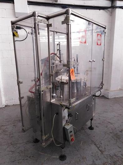 Used Capmatic Patriot FC21 monoblock filler and capper