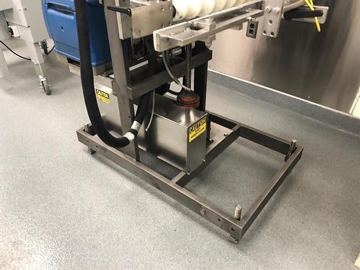 Used Thiele model 34-000 4-Head Rotary Placer with Nordson Hot Melt