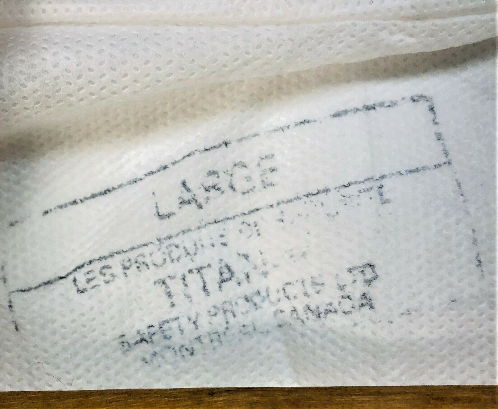 New open box Titan Safety Disposable Lab Coat with Snap Closure - Size Large (Pack of 7 Coats)