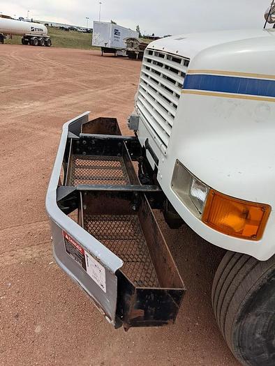 Used 2000 International 4900 Tandem Axle Flatbed Altec A65 70' Articulated Bucket truck