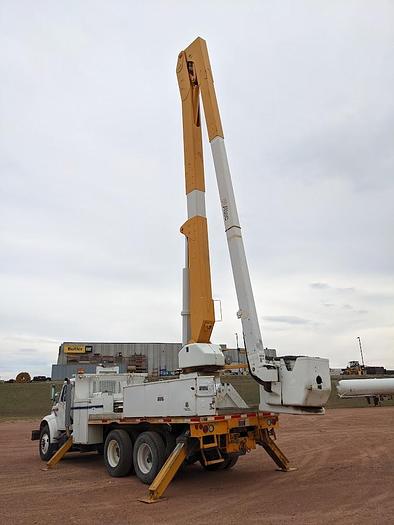 Used 2000 International 4900 Tandem Axle Flatbed Altec A65 70' Articulated Bucket truck