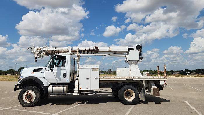 Used 2012 International 7300 4x4 12' Flatbed Altec DM47 TR 47' Digger Derrick
