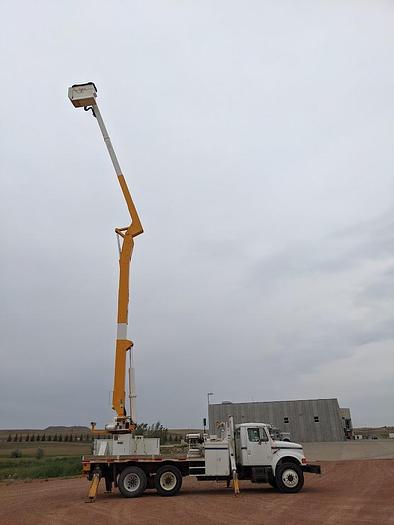 Used 2000 International 4900 Tandem Axle Flatbed Altec A65 70' Articulated Bucket truck