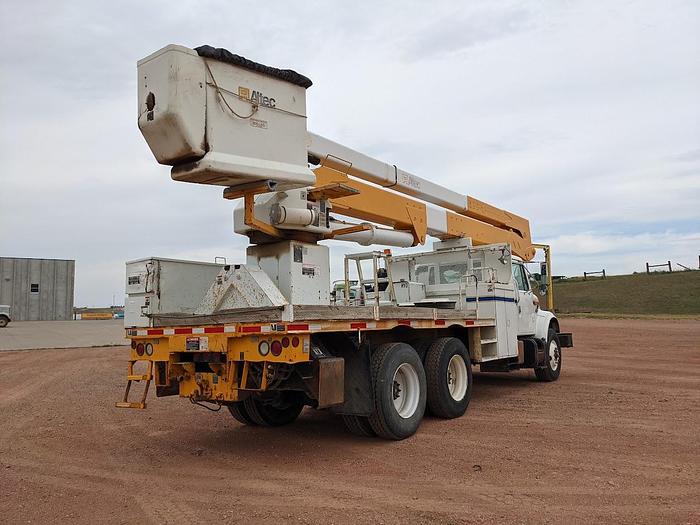 Used 2000 International 4900 Tandem Axle Flatbed Altec A65 70' Articulated Bucket truck