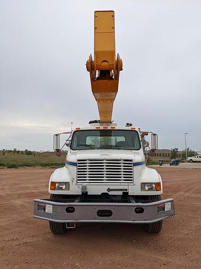 Used 2000 International 4900 Tandem Axle Flatbed Altec A65 70' Articulated Bucket truck