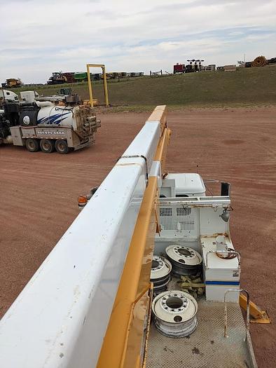 Used 2000 International 4900 Tandem Axle Flatbed Altec A65 70' Articulated Bucket truck