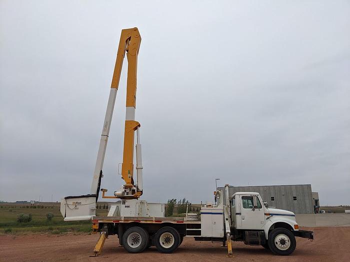 Used 2000 International 4900 Tandem Axle Flatbed Altec A65 70' Articulated Bucket truck