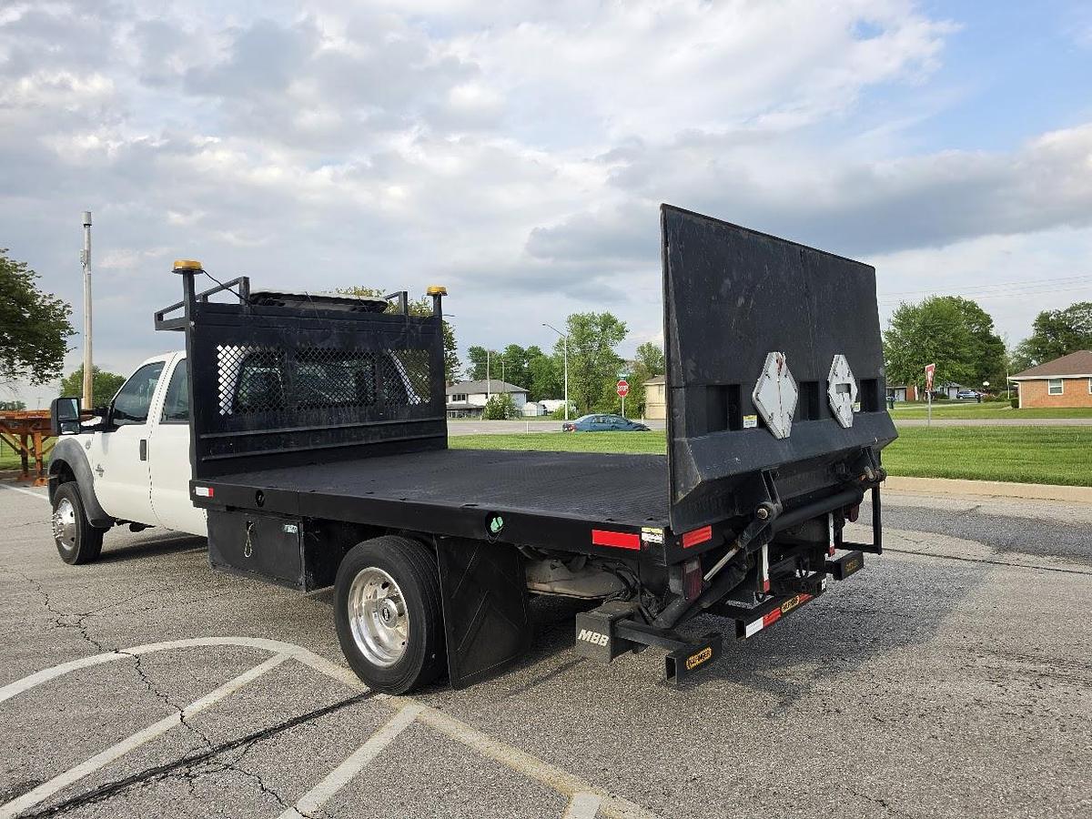Used 2013 F550 4x4 12' Flatbed 4' Lift Gate