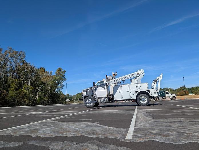 Used 2005 GMC 8500 Bucket Truck with an Altec AT40C Telescopic Cable Placer with Reel Bar and Winder