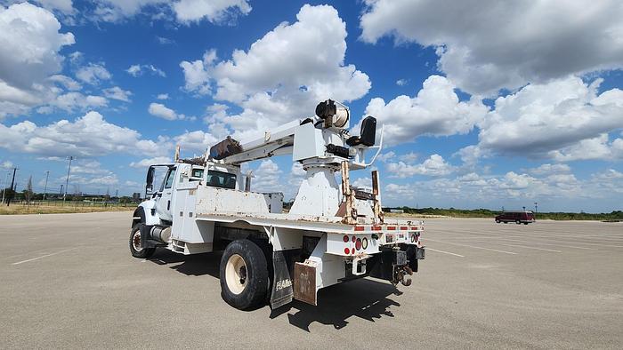 Used 2012 International 7300 4x4 12' Flatbed Altec DM47 TR 47' Digger Derrick