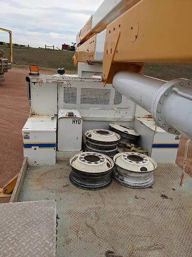 Used 2000 International 4900 Tandem Axle Flatbed Altec A65 70' Articulated Bucket truck