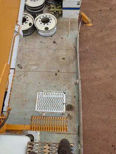 Used 2000 International 4900 Tandem Axle Flatbed Altec A65 70' Articulated Bucket truck