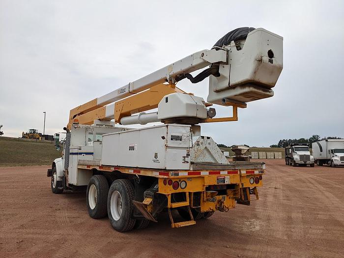 Used 2000 International 4900 Tandem Axle Flatbed Altec A65 70' Articulated Bucket truck