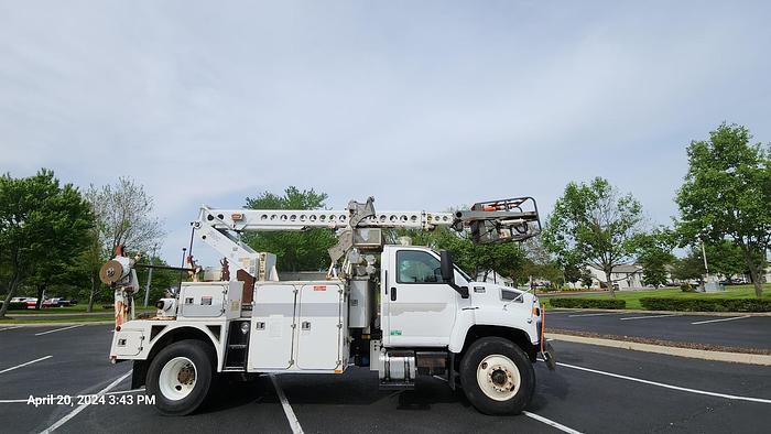 Used 2005 GMC 8500 Bucket Truck with an Altec AT40C Telescopic Cable Placer with Reel Bar and Winder