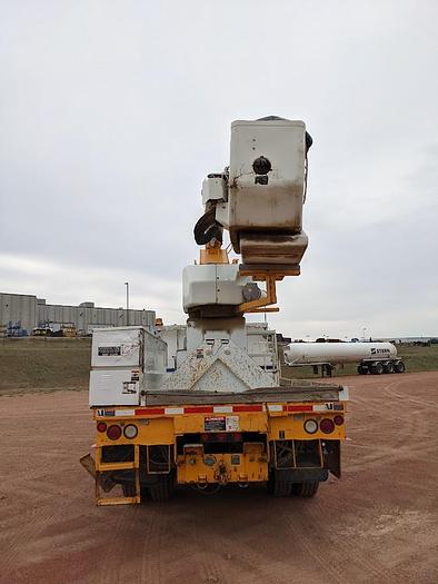 Used 2000 International 4900 Tandem Axle Flatbed Altec A65 70' Articulated Bucket truck