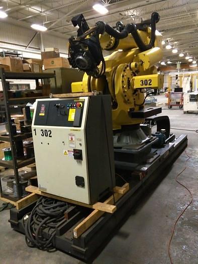 Used 2012 FANUC  M900iB/700 6 AXIS CNC ROBOT WITH R30iB CONTROLLER  & 7TH AXIS 15' LONG TRACK.