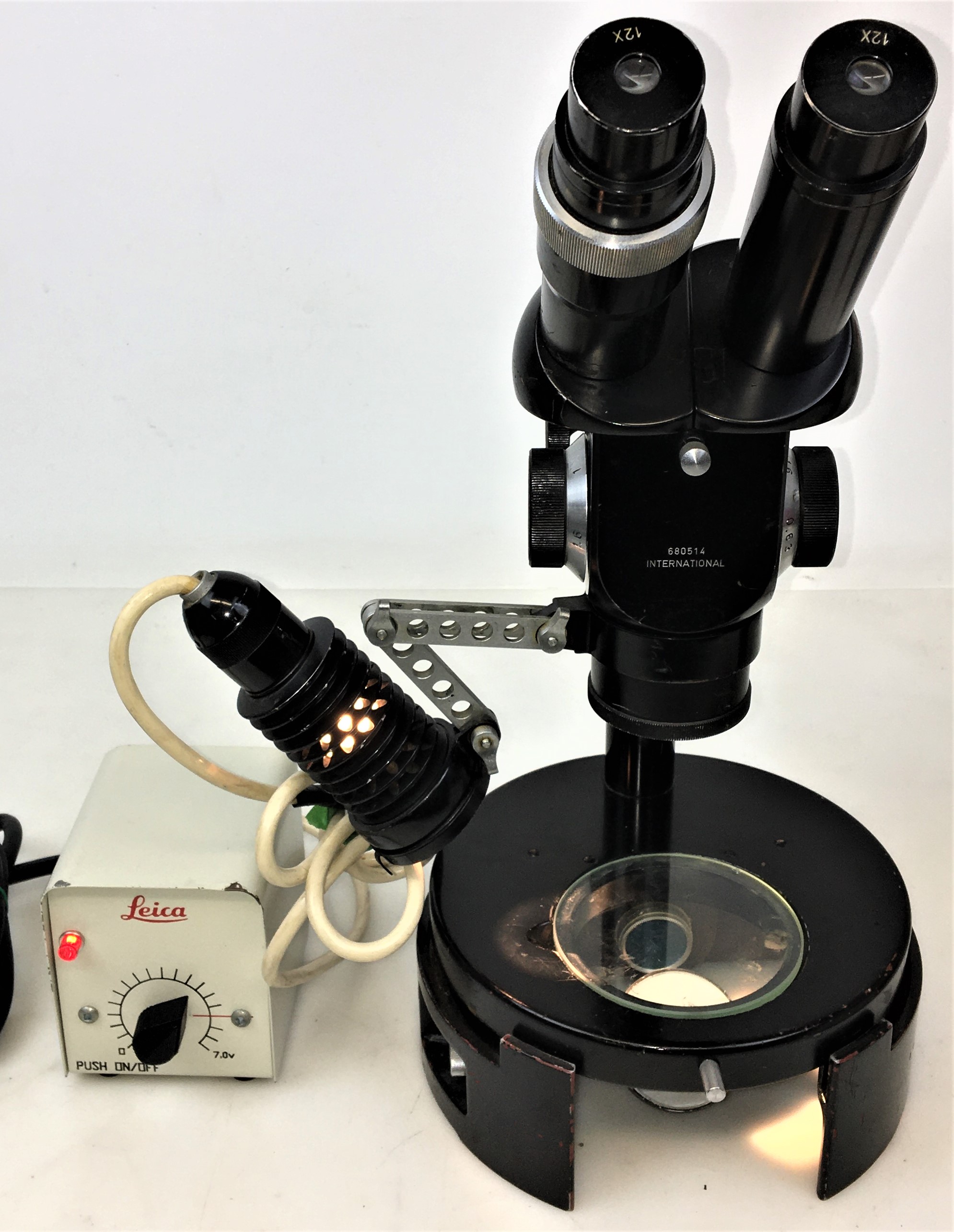 Used International Binocular Stereo Microscope with Variable Transformer and Lamp - 7.56X to 48X