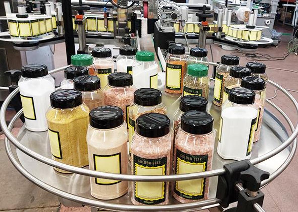 Linea automatica per tappatura ed etichettatura barattoli - MCE