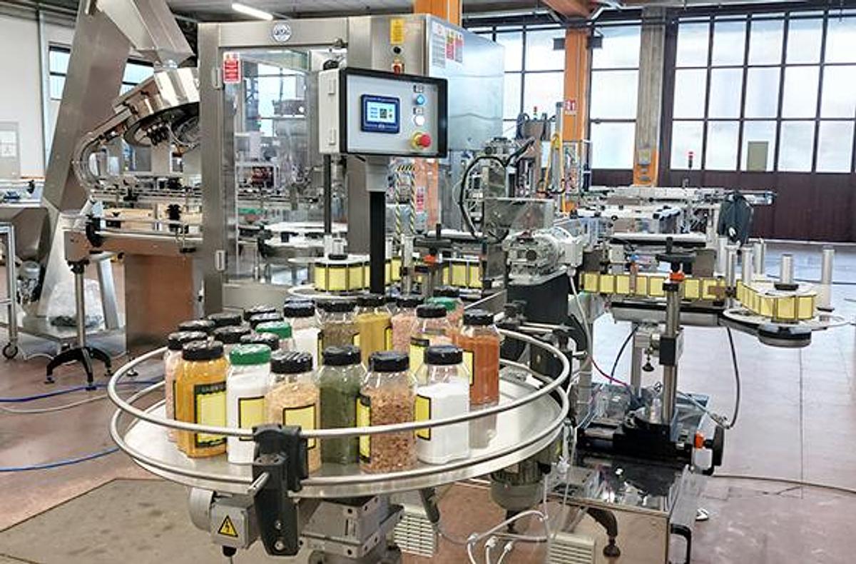Linea automatica per tappatura ed etichettatura barattoli - MCE