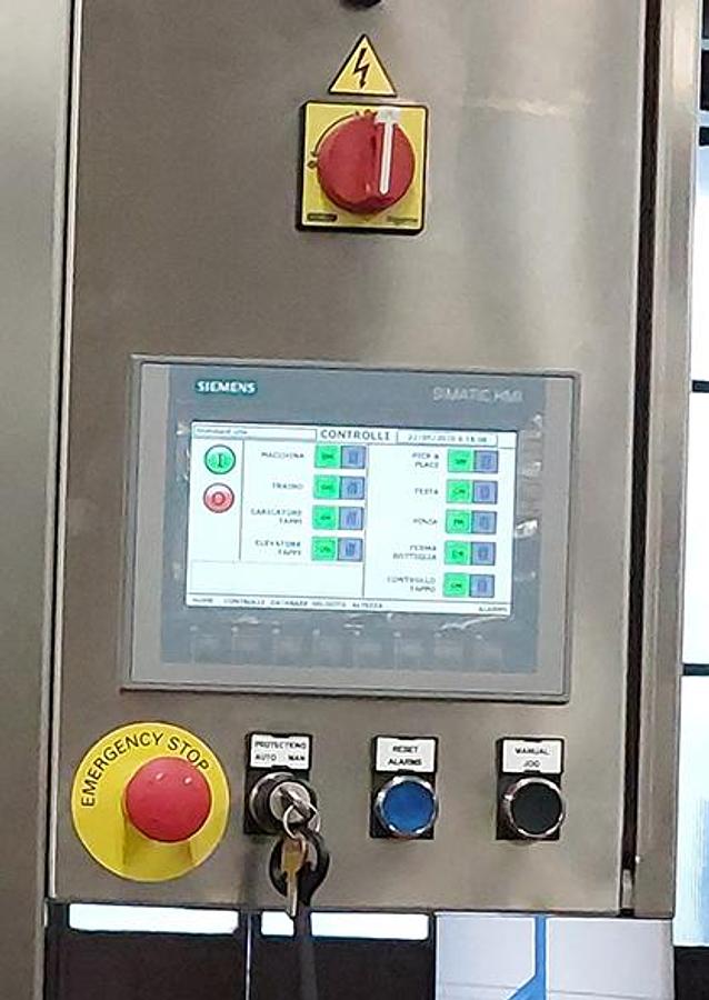 Linea automatica per tappatura ed etichettatura barattoli - MCE