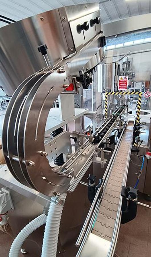 Linea automatica per tappatura ed etichettatura barattoli - MCE
