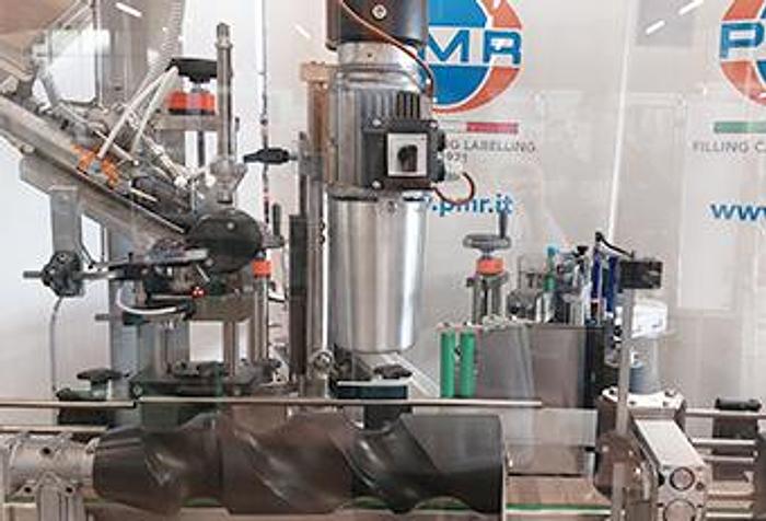 METCAP LIQUORI - ETICHETTATURA E CAPSULATRICE