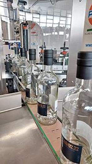 METCAP LIQUORI - ETICHETTATURA E CAPSULATRICE