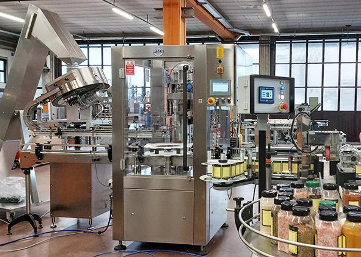 Linea automatica per tappatura ed etichettatura barattoli - MCE