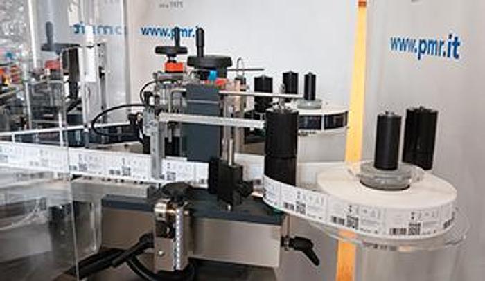 METCAP LIQUORI - ETICHETTATURA E CAPSULATRICE