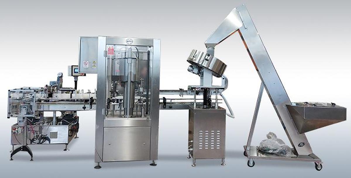 Linea automatica per tappatura ed etichettatura barattoli - MCE