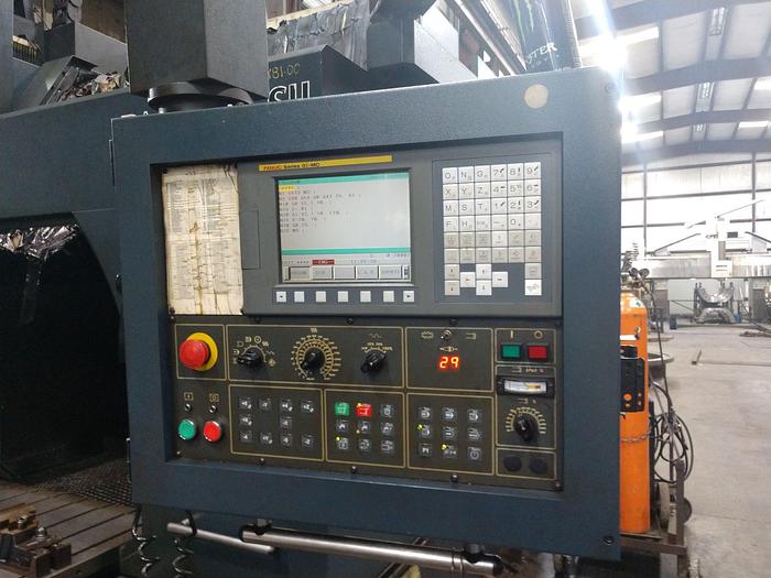 Used 2005 Johnford Bridge Style Vertical Machining Center, Model DCM 2100SH, Table 60" X 86", X Travel 81", Y Travel 72", Z Travel, 31.5", Distance under Rail 37.5", 10,000 RPM, 30HP, ASH A63 tooling, Fanuc CNC.5,