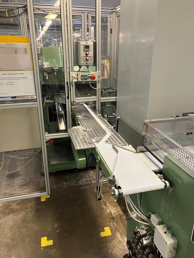 Used Loesch chocolate coin foiling machine
