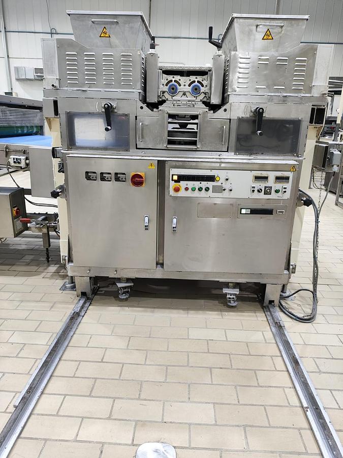 Used Rheon multi co-extruder encruster with wire cutter