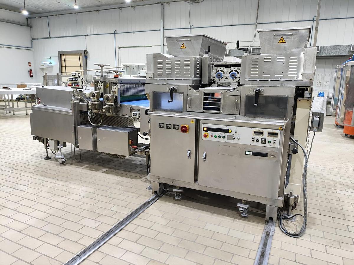 Used Rheon multi co-extruder encruster with wire cutter