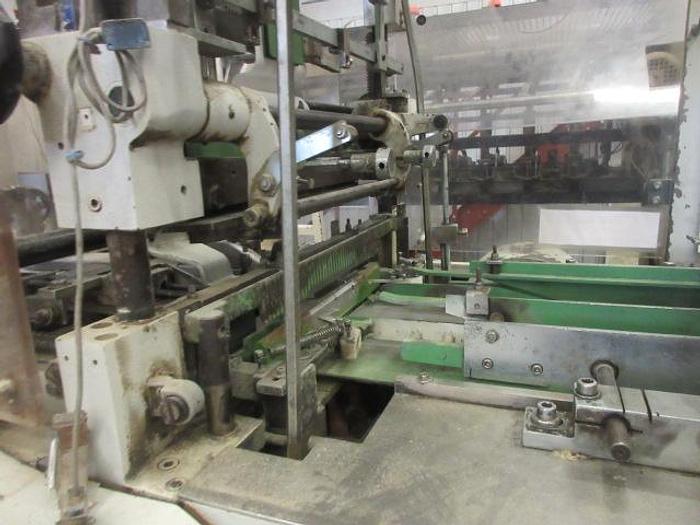 Used Teknipack EA60 biscuit roll wrapping machine
