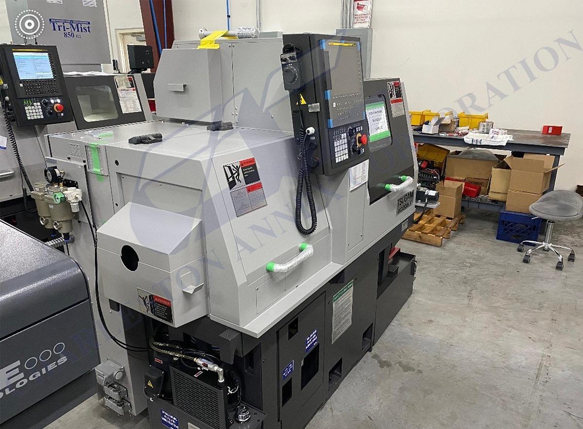 Used Tsugami B0206-V 6-Axis CNC Swiss Lathe with Edge Minuteman 320 SE Bar Feed