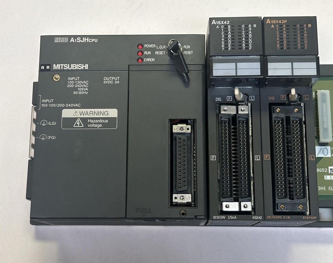 Used MITSUBISHI,A1SJHCPU,CPU UNIT W/ A1SX42 & A1SY42P MODULES