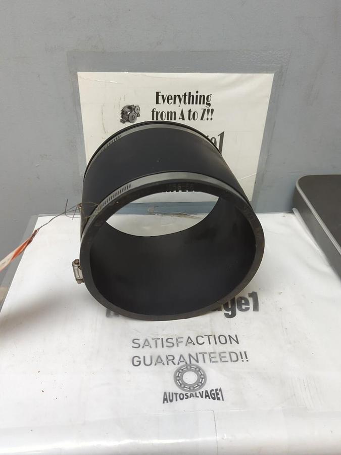 CONNECTS,6 INCH,CI/PLASTIC TO 6 INCH CI/PLASTIC RUBBER COUPLING NOS