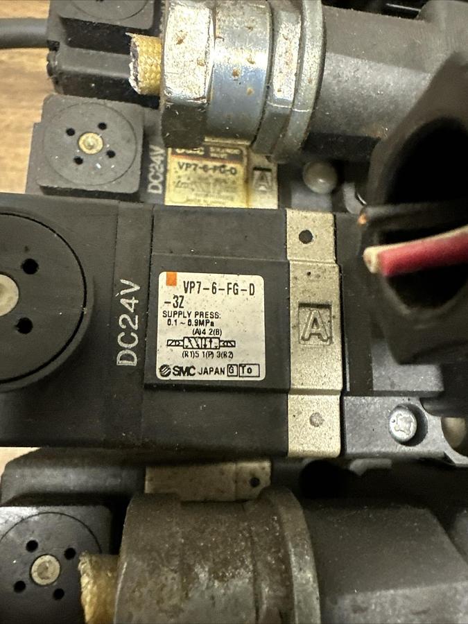 Used SMC,7 EA.VP7-6-FG-D,Solenoid Valves 1EA. ARB250-00 W/10 Valve Manifold