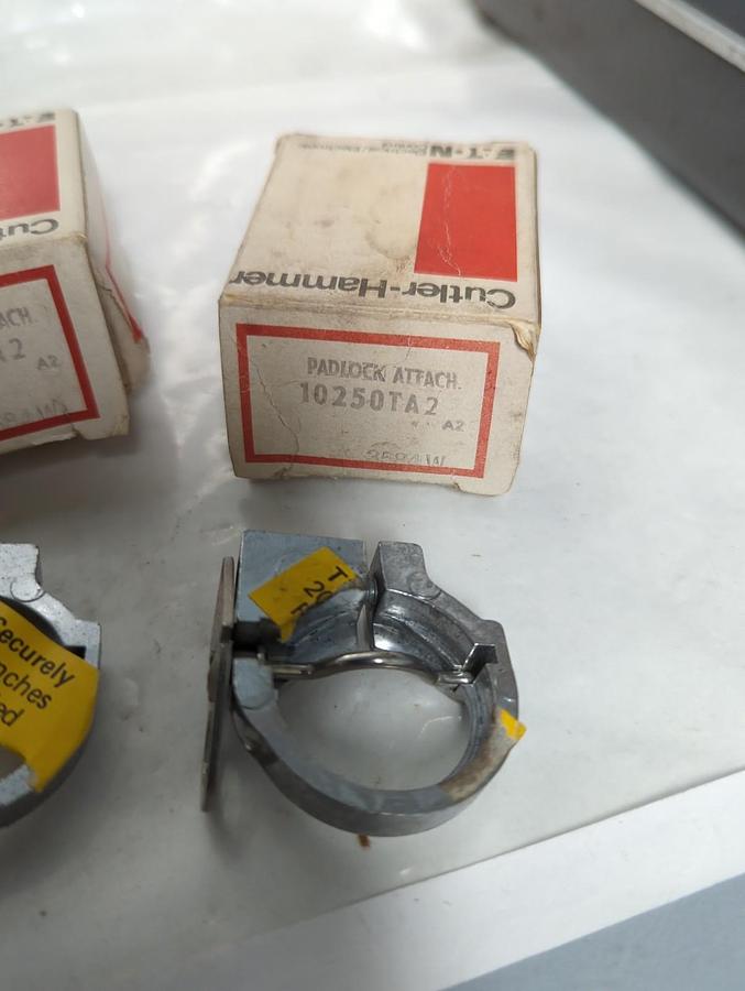 CUTLER HAMMER,10250TA2,PADLOCK ATTACHMENT FOR PUSHBUTTON LOT OF 4 NOS