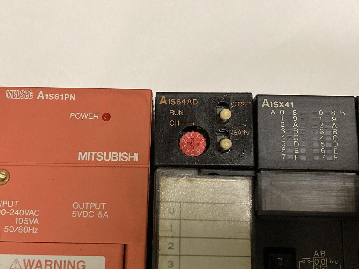 Used Mitsubishi,A1S61PN/A1S64AD/A1SX41(x3) /A1SY42 (x2) /A1SY41,Rack Assembly