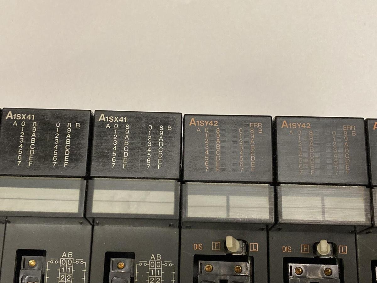 Used Mitsubishi,A1S61PN/A1S64AD/A1SX41(x3) /A1SY42 (x2) /A1SY41,Rack Assembly