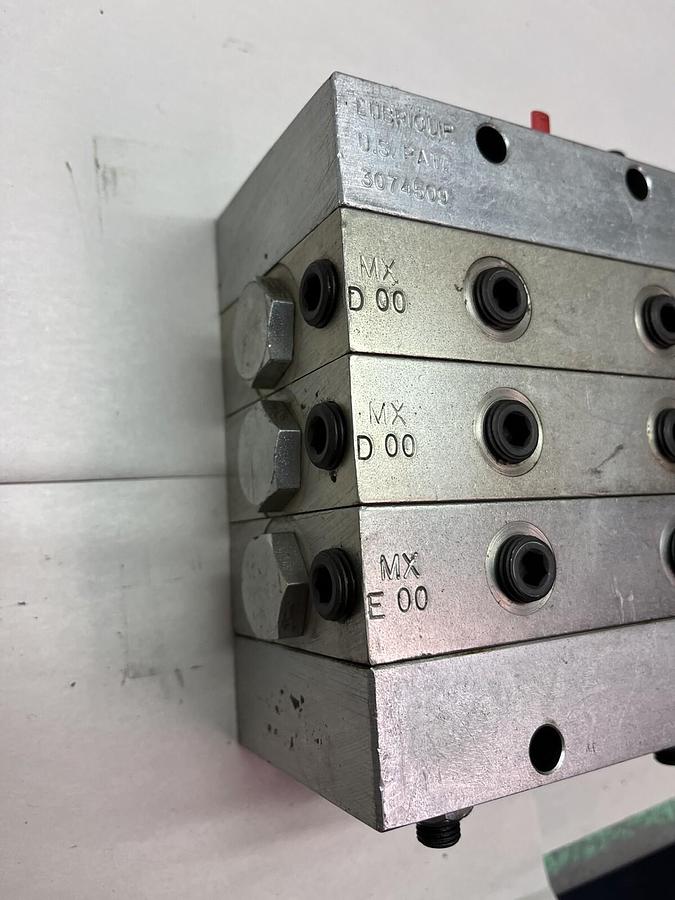 Used LUBRIQUIP,MXE-00-25S,W TWO MXD-00-50S VALVE BANK