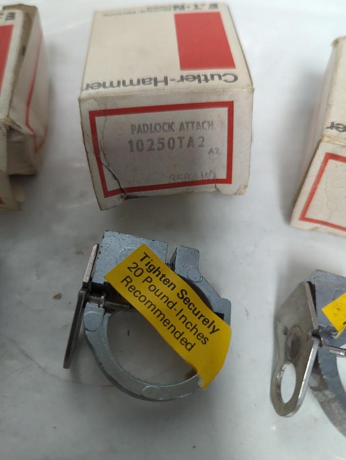 CUTLER HAMMER,10250TA2,PADLOCK ATTACHMENT FOR PUSHBUTTON LOT OF 4 NOS