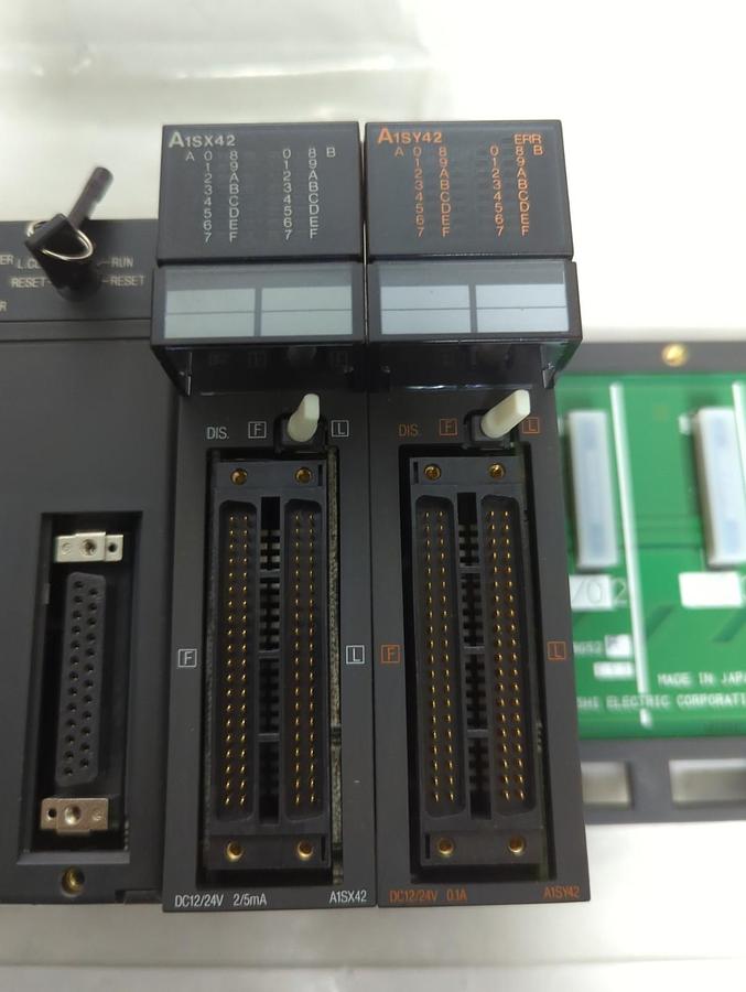 Used MITSUBISHI,A1SJHCPU,CPU UNIT W/ 5-SLOT RACK W/ A1SX42 AND A1SY42 MODULES
