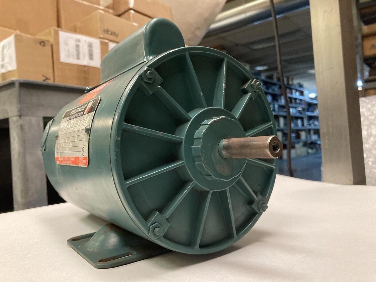 Used Reliance,D77B2690M,1/4 Hp AC Motor 1140RPM  208-230/460 Volts 56C Frame