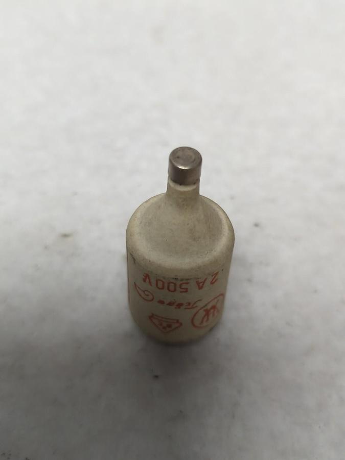Used TRAGA,2A,CERAMIC BOTTLE FUSE 2 AMP PRE-OWNED